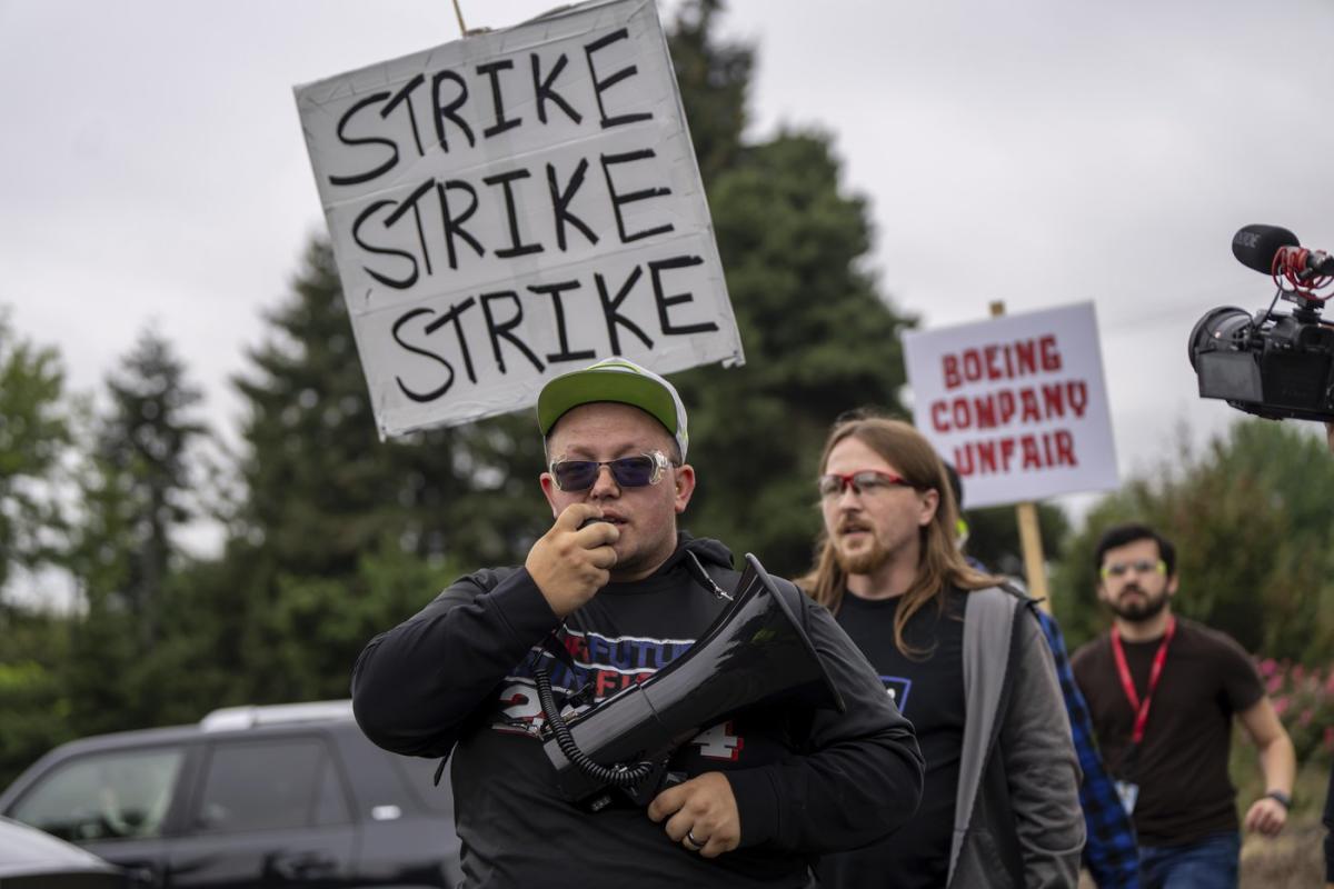 Boeing factory workers vote whether to strike and shut down aircraft production