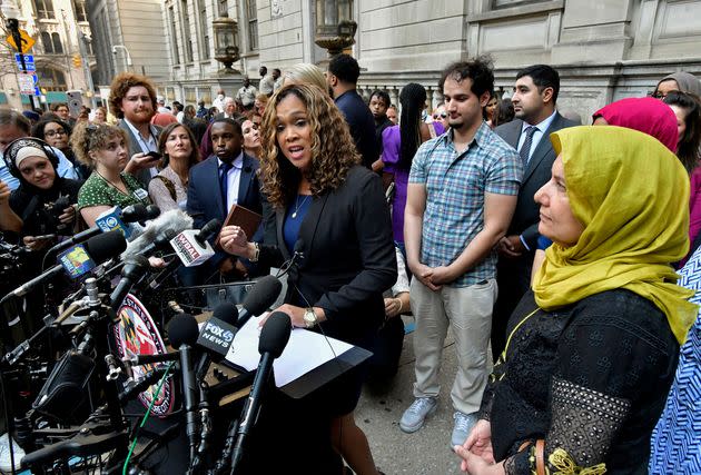 State’s Attorney Marilyn Mosby (left) discusses the release of Adnan Syed after his conviction was overturned on Monday. Syed's mother, Shamim Syed (right), looks on with another son, standing behind Mosby. (Photo: via Associated Press)