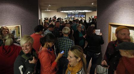 Couples wait to apply for marriage licenses at the Salt Lake County Clerks office in Salt Lake City, Utah, December 20, 2013. REUTERS/Jim Urquhart