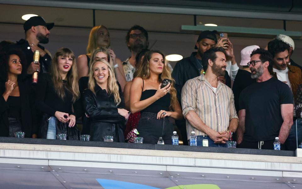 The gang back together: Taylor Swift, Blake Lively, Hugh Jackman and Ryan Reynolds at an NFL football game