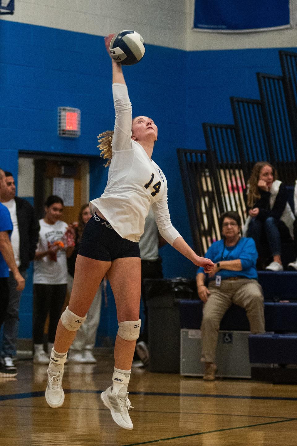 Pine Bush's Ellie Hoppe serves the ball during the girls Class AAA semifinal volleyball game at Wallkill High School in Wallkill, NY on Wednesday, November 8, 2023. Pine Bush defeated North Rockland. KELLY MARSH/FOR THE TIMES HERALD-RECORD