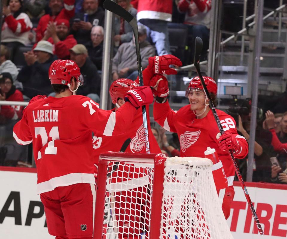Detroit Red Wings left wing Tyler Bertuzzi (59) celebrate with teammates after scoring against Toronto Maple Leafs goaltender Ilya Samsonov (35) during first period action at Little Caesars Arena Friday, October 7, 2022.