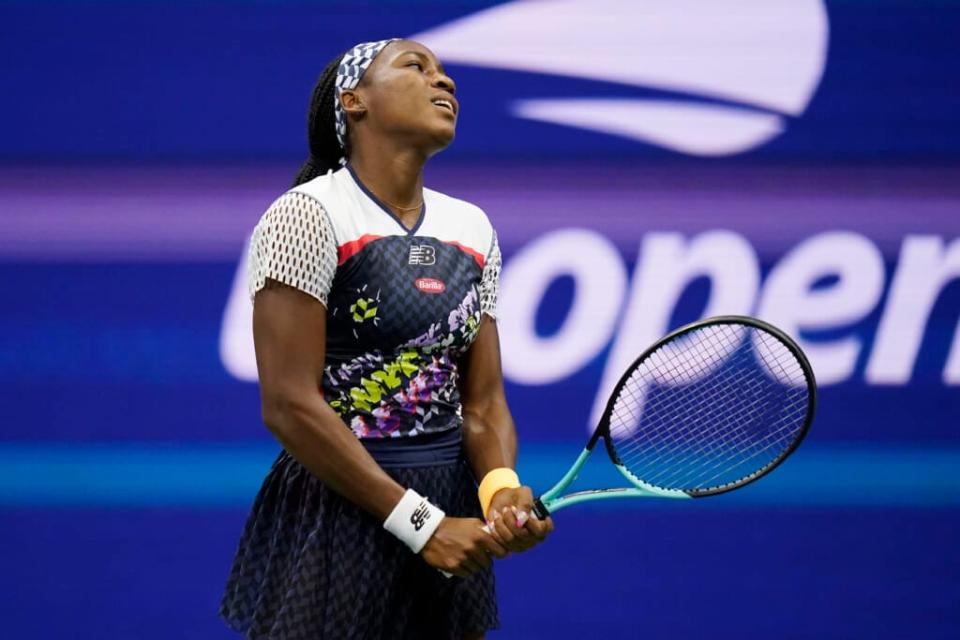 Coco Gauff reacts as she plays Caroline Garcia, of France, during the quarterfinals of the U.S. Open tennis championships, Tuesday, Sept. 6, 2022, in New York. (AP Photo/Charles Krupa)