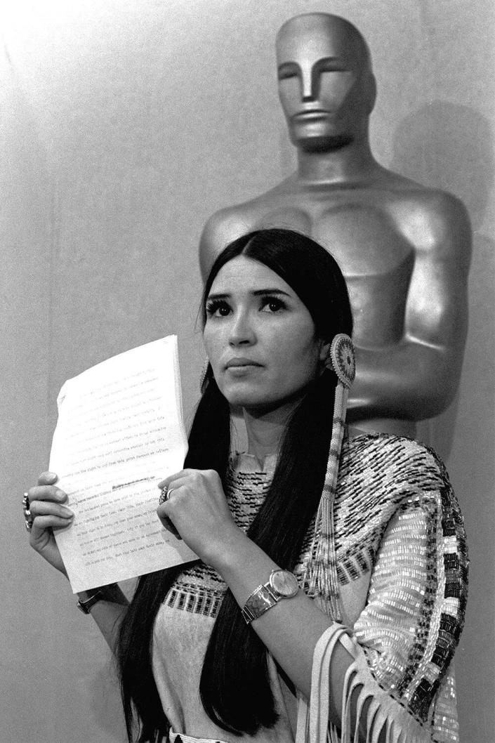 Oscars Brando A woman in Native American Indian dress, who indentified herself as Sacheen Littlefeather, tells the audience at the Academy Awards ceremony in Los Angeles, that Marlon Brando was declining to accept his Oscar as best actor for his role in &quot;The Godfather.&quot; Littlefeather said Brando was protesting &quot;the treatment of the American Indian in motion pictures and on televison, and because of the recent events at Wounded Knee ACADEMY AWARDS BRANDO, LOS ANGELES, USA