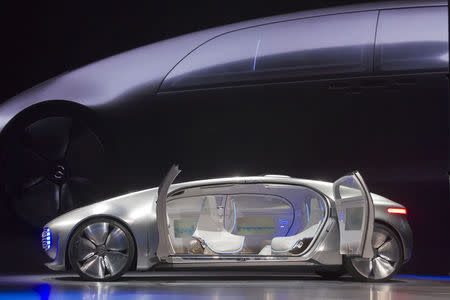 The Mercedes-Benz F015 Luxury in Motion autonomous concept car is shown on stage. REUTERS/Steve Marcus