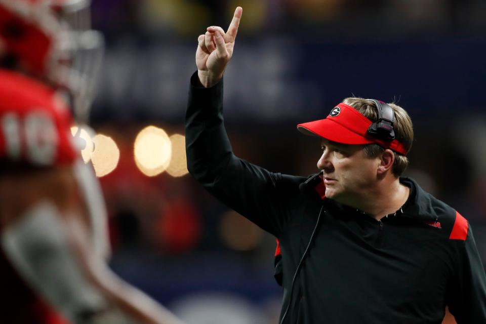 Georgia head coach Kirby Smart reacts after GeorgiaÃ•s first touchdown during the first half of the SEC Championship NCAA college football game between LSU and Georgia in Atlanta, on Saturday, Dec. 3, 2022.