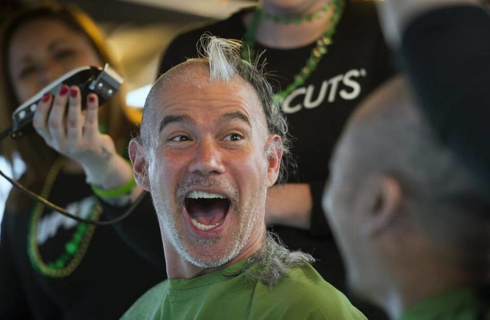 Sonny Mayugba of Red Rabbit reacts as he looks at Billy Ngo of Kru during the St. Baldrick’s Foundation fundraiser that supports childhood cancer research, at de Vere’s Irish Pub in 2017. The de Vere White brothers announced Monday that both the Sacramento and the Davis locations would close permanently after Oct. 3.