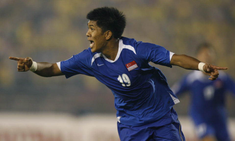 Singapore's Mohd Khairul Amri Mohd Kamal celebrates after scoring past Thailand during the second-leg of the ASEAN championship soccer final in Bangkok February 4, 2007.  REUTERS/Adrees Latif    (THAILAND)