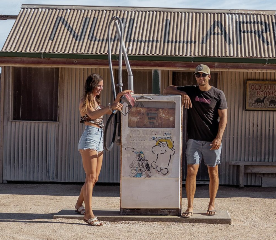 Travel couple pictured at a roadhouse in Nullabor 
