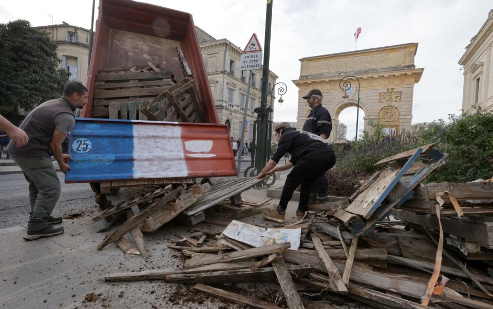 Farmers dump waste on the streets of Montpellier, in the south of France, on Friday