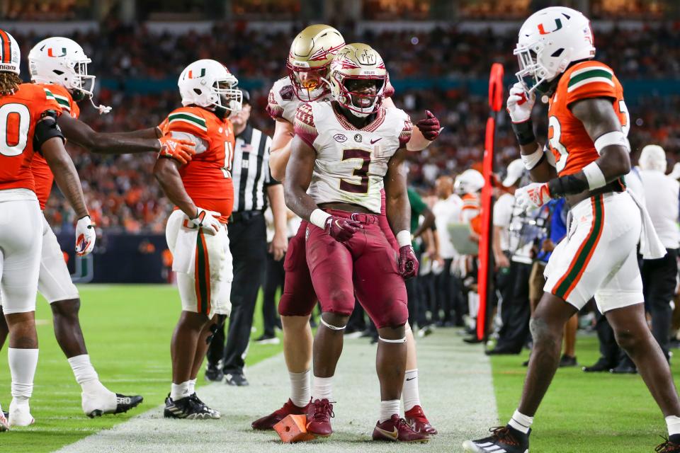 Nov 5, 2022; Miami Gardens, Florida, USA; Florida State Seminoles running back Trey Benson (3) celebrates after scoring a touchdown during the second quarter against the Miami Hurricanes at Hard Rock Stadium. Mandatory Credit: Sam Navarro-USA TODAY Sports