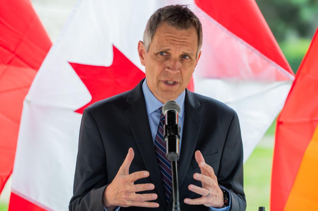 Ottawa Mayor Mark Sutcliffe has been in talks with the federal government to fund a welcoming centre for newcomers, including asylum seekers.  (Spencer Colby/The Canadian Press - image credit)