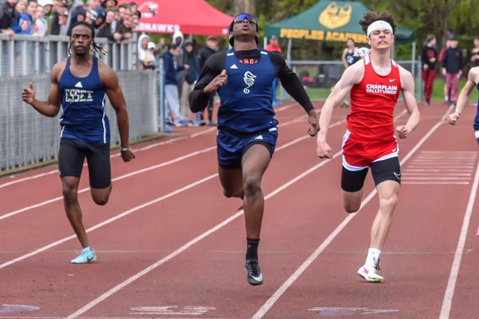 Burlington's Ahmed Diawara wins the boys 200 meter sprint at the 51st annual Burlington High School Track and Field Invitational on Saturday.