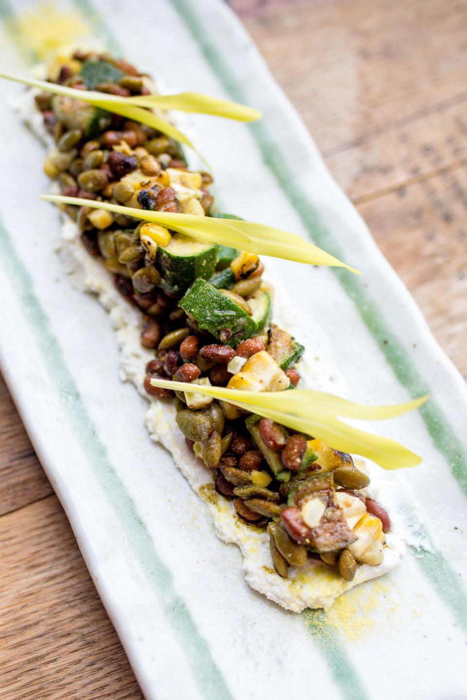 The Three Sisters Salad at 610 Magnolia restaurant in Louisville features Capriole Farm goat cheese, pepita, corn shoot, and pumpkin seed.