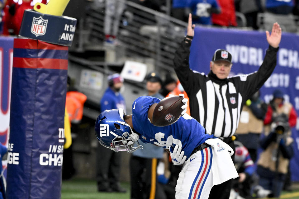 New York Giants wide receiver Darius Slayton (86) reacts after scoring a touchdown against the Washington Football Team during the fourth quarter of an NFL football game, Saturday, Jan. 9, 2021, in East Rutherford, N.J. (AP Photo/Bill Kostroun)