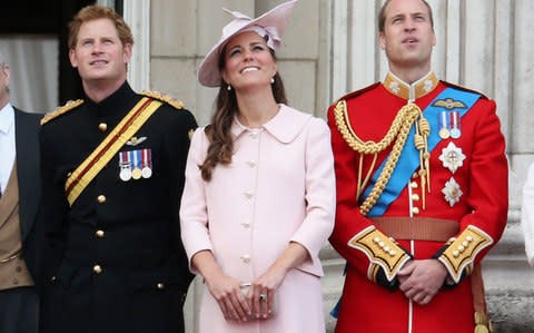 Prince Harry with the Duke and Duchess of Cambridge in 2013 - Credit: Chris Jackson/Getty
