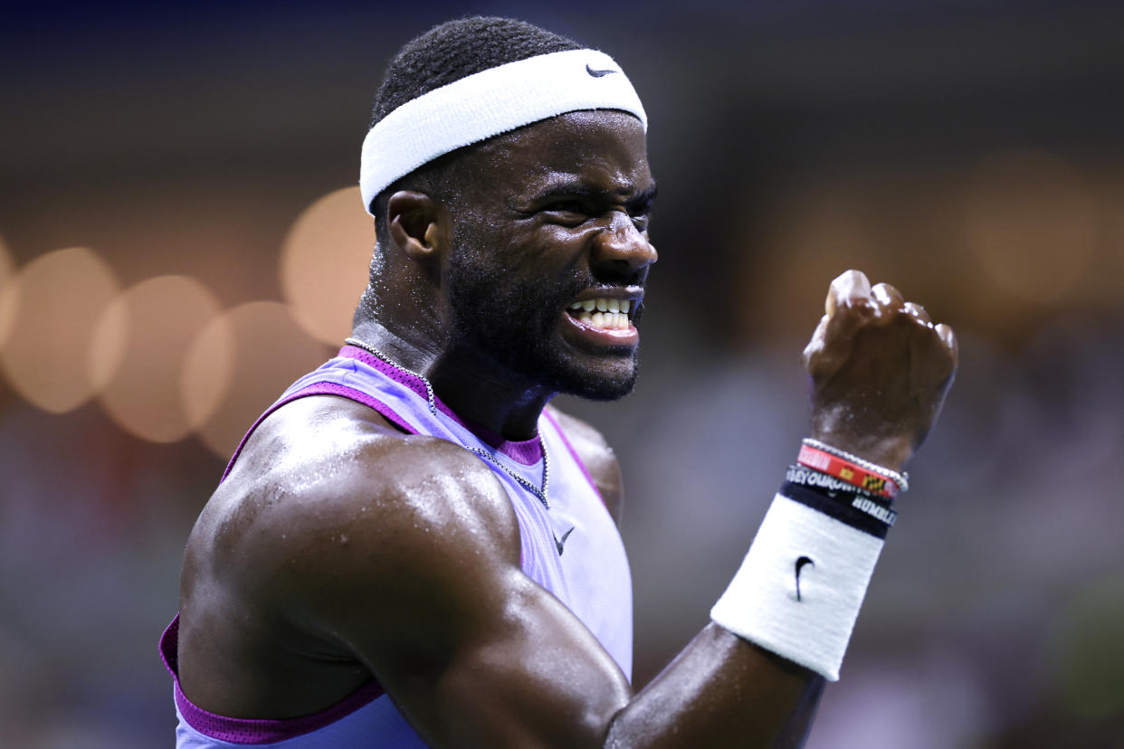 Frances Tiafoe, of the United States, celebrates after winning a point against Grigor Dimitrov, of Bulgaria, during the quarterfinals of the U.S. Open tennis championships, Tuesday, Sept. 3, 2024, in New York. (AP Photo/Adam Hunger)