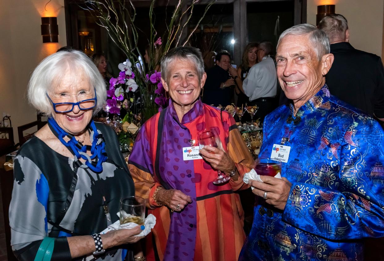 Edie Groesbeck (left), Rosanne Kumins and Bud Sydenstricker attend the Partners for Life season opener for DAP Health on Tuesday, Nov. 9, 2021.