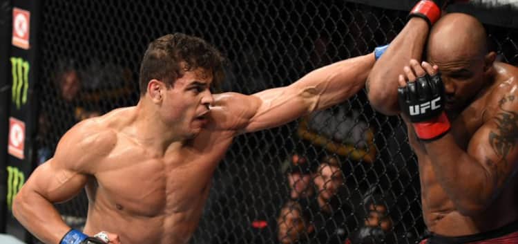 Paulo Costa punches Yoel Romero at UFC 241