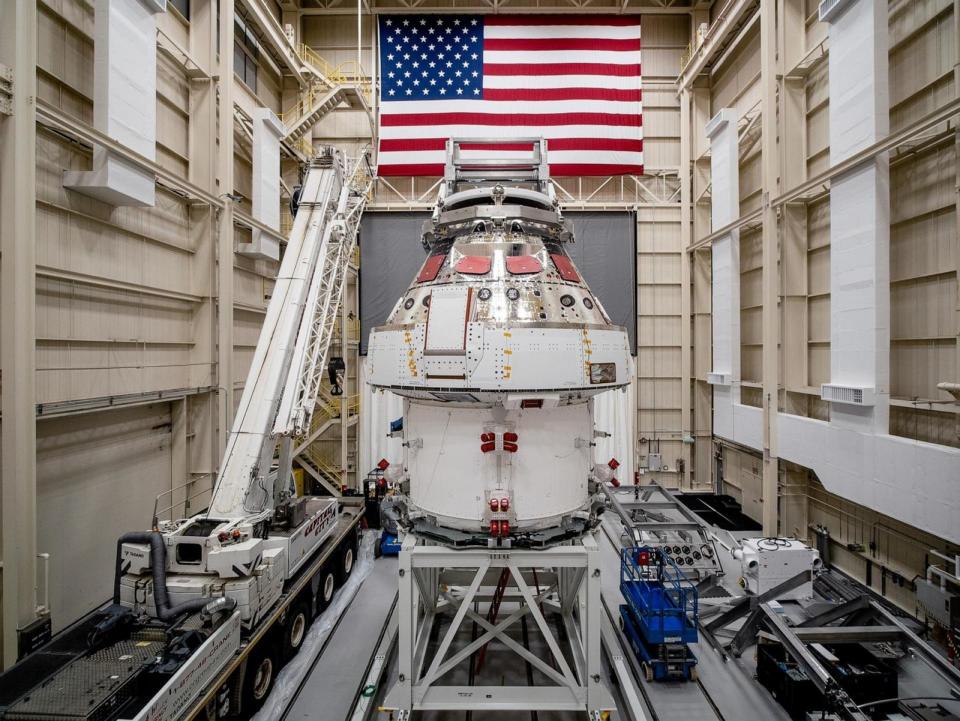 PHOTO: NASA’s Orion spacecraft–the crew module and European-built service module—is being lifted, Dec. 1, 2019, into a thermal cage and readied for its move into the vacuum chamber at NASA’s Neil A. Armstrong Test Facility in Ohio. (NASA)
