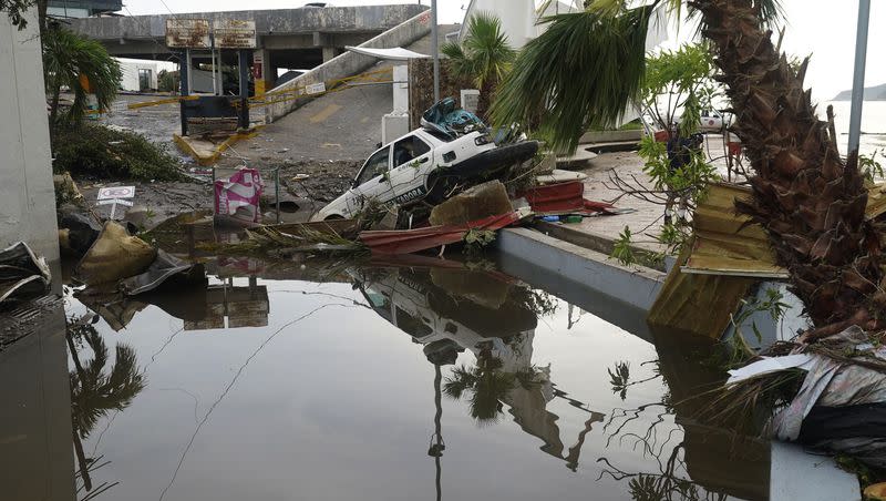 A street is strewn with debris after Hurricane Otis ripped through Acapulco, Mexico, Wednesday, Oct. 25, 2023. Hurricane Otis turned from mild to monster in record time, and scientists are struggling to figure out how — and why they didn’t see it coming.