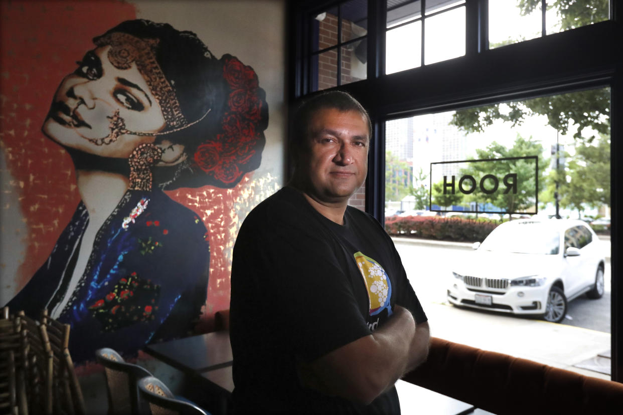 Manish Mallick, owner of the Indian restaurant ROOH, poses for a portrait Tuesday, July 14, 2020, outside the West Loop restaurant in Chicago. When Mallick opened his Chicago restaurant last year, he was focused on building his business and getting rave reviews about the eatery's 