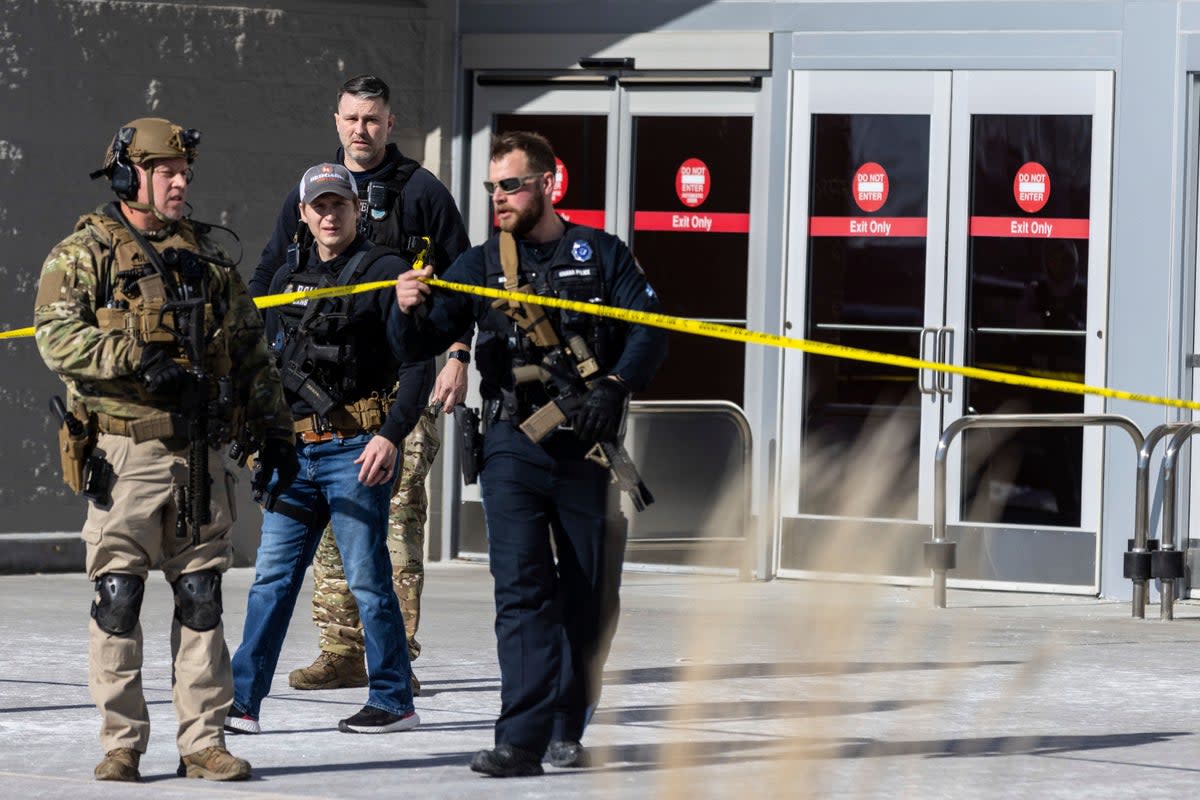 Law enforcement officers are pictured at the scene of a reported shooting at a Target store in Omaha (AP)