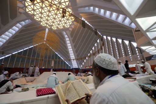 Pakistani Muslims attend Itikaf worship during the holy month of Ramadan at the Grand Faisal mosque in Islamabad. The global Muslim community of 1.6 billion people agree on the core principles of their faith, but differ widely in religiosity and religious tolerance, according to a poll published Thursday