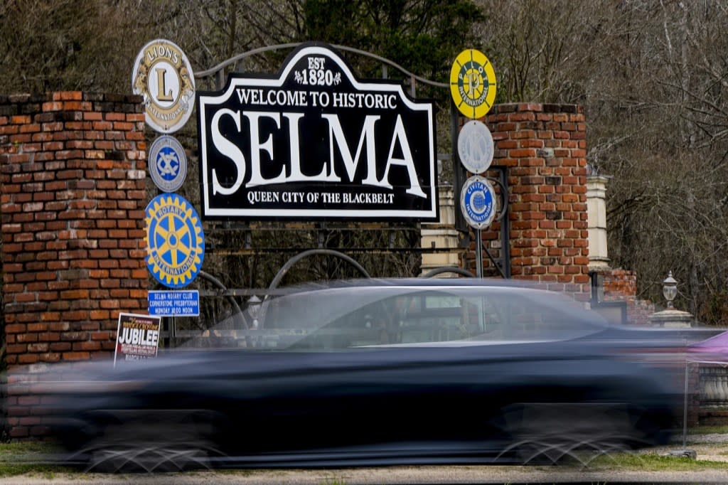 A vehicle passes by the town welcome sign, Thursday, Feb. 29, 2024, in Selma, Ala. (AP Photo/Mike Stewart)