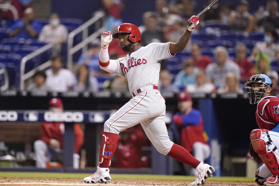 Philadelphia Phillies' Andrew McCutchen grounds into a fielders choice during the fourth inning of a baseball game against the Miami Marlins, Saturday, Oct. 2, 2021, in Miami. McCutchen advanced to first and Bryce Harper was out at second on the play.(AP Photo/Lynne Sladky)