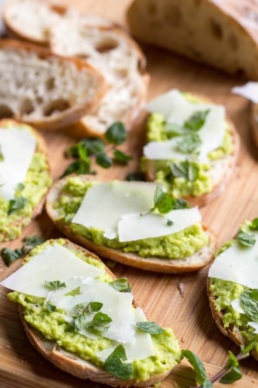 <p>Coley Cooks</p><p>Creamy, lemony fava bean puree tops crispy toasted bread and finished with sharp, salty Pecorino cheese and fresh mint. It's simple, seasonal and sooo delicious.</p><p><strong>Get the recipe: <a href="https://coleycooks.com/fava-bean-crostini/" rel="nofollow noopener" target="_blank" data-ylk="slk:Fava Bean Crostini;elm:context_link;itc:0;sec:content-canvas" class="link rapid-noclick-resp"><em>Fava Bean Crostini</em></a></strong></p>