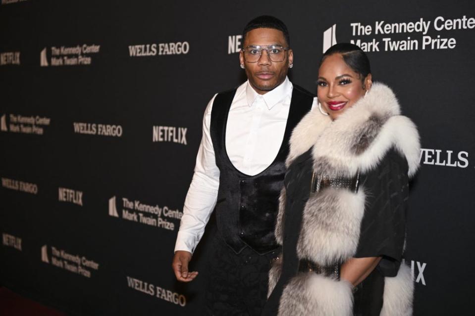 Nelly and Ashanti arrive for the 25th Annual Mark Twain Prize For American Humor at the John F. Kennedy Center for the Performing Arts on March 24. AFP via Getty Images