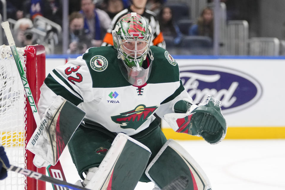 Minnesota Wild goaltender Filip Gustavsson watches play during the second period of the team's NHL hockey game against the New York Islanders on Thursday, Jan. 12, 2023, in Elmont, N.Y. (AP Photo/Frank Franklin II)