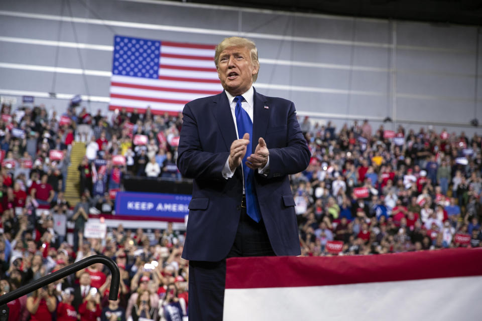 President Donald Trump arrives at UW-Milwaukee Panther Arena to speak at a campaign rally, Tuesday, Jan. 14, 2020, in Milwaukee. (AP Photo/ Evan Vucci)