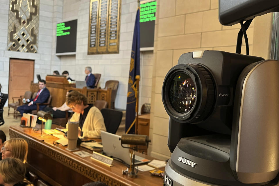 One of several cameras set up to capture live debate in the chamber of the Nebraska Legislature is shown, Wednesday, June 7, 2023 in Lincoln, Neb. State lawmakers say their emails and phone contacts this session revealed a growing number of people who watched the Nebraska Legislature's debates this year either on public television or on their computers, phones and tablets. Some even streamed the debate in their cars. (AP Photo/Margery Beck)