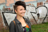 BERLIN, GERMANY - JULY 21: Teija Vaittinen wears an asymmetrical haircut at the second annual Hipster Olympics on July 21, 2012 in Berlin, Germany. With events such as the "Horn-Rimmed Glasses Throw," "Skinny Jeans Tug-O-War," "Vinyl Record Spinning Contest" and "Cloth Tote Sack Race," the Hipster Olympics both mocks and celebrates the Hipster subculture, which some critics claim could never be accurately defined and others that it never existed in the first place. The imprecise nature of determining what makes one a member means that the symptomatic elements of adherants to the group vary in each country, but the archetype of the version in Berlin, one of the more popular locations for those following its lifestyle, along with London and Brooklyn, includes a penchant for canvas tote bags, the carbonated yerba mate drink Club Mate, analogue film cameras, asymmetrical haircuts, 80s neon fashion, and, allegedly, a heavy dose of irony. To some in Berlin, members of the hipster "movement" have replaced a former unwanted identity in gentrifying neighborhoods, the Yuppie, for targets of criticism, as landlords raise rents in the areas to which they relocate, particularly the up-and-coming neighborhood of Neukoelln. (Photo by Adam Berry/Getty Images)