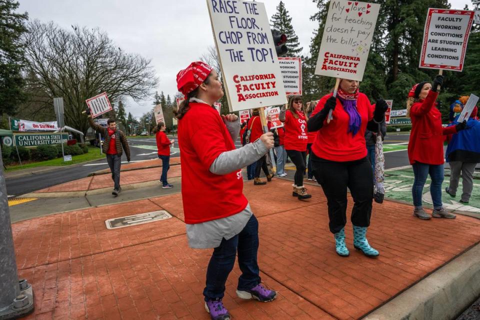 Sacramento State librarian Rachel Stark, left, joins faculty at a weeklong strike at the university on Monday.