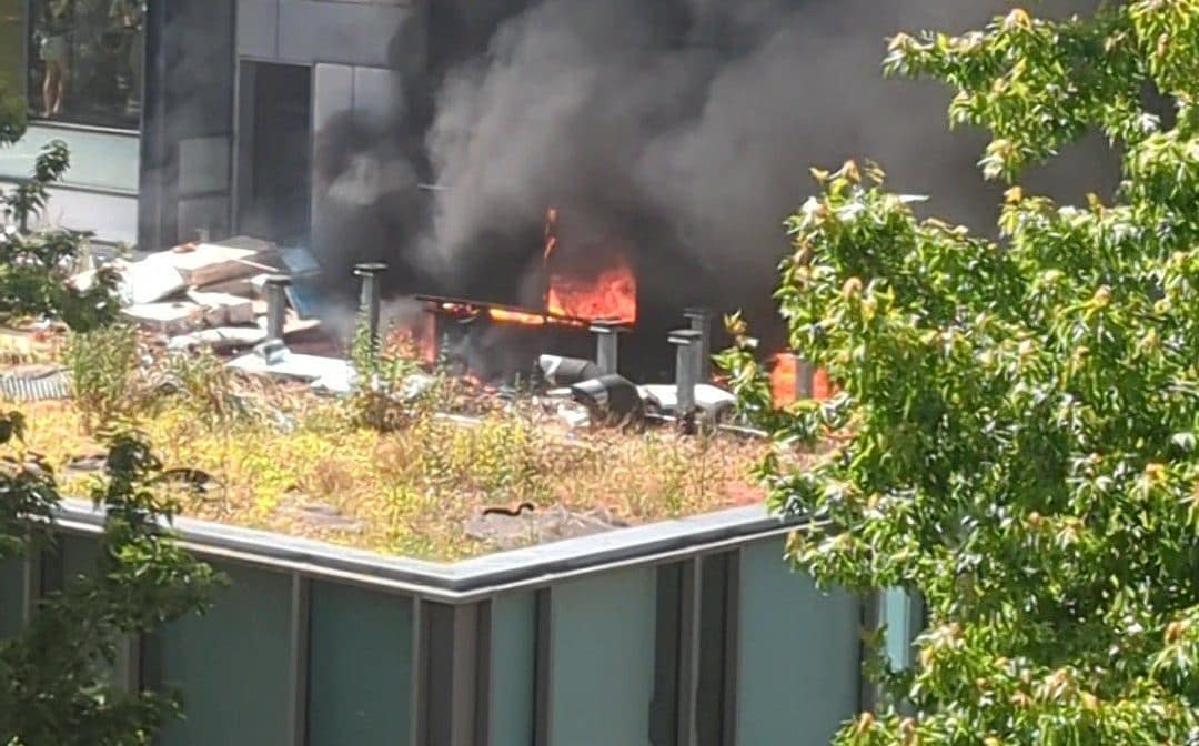 Footage recorded from over the road shows the third storey flat up in flames, with plumes of black smoke billowing from the windows