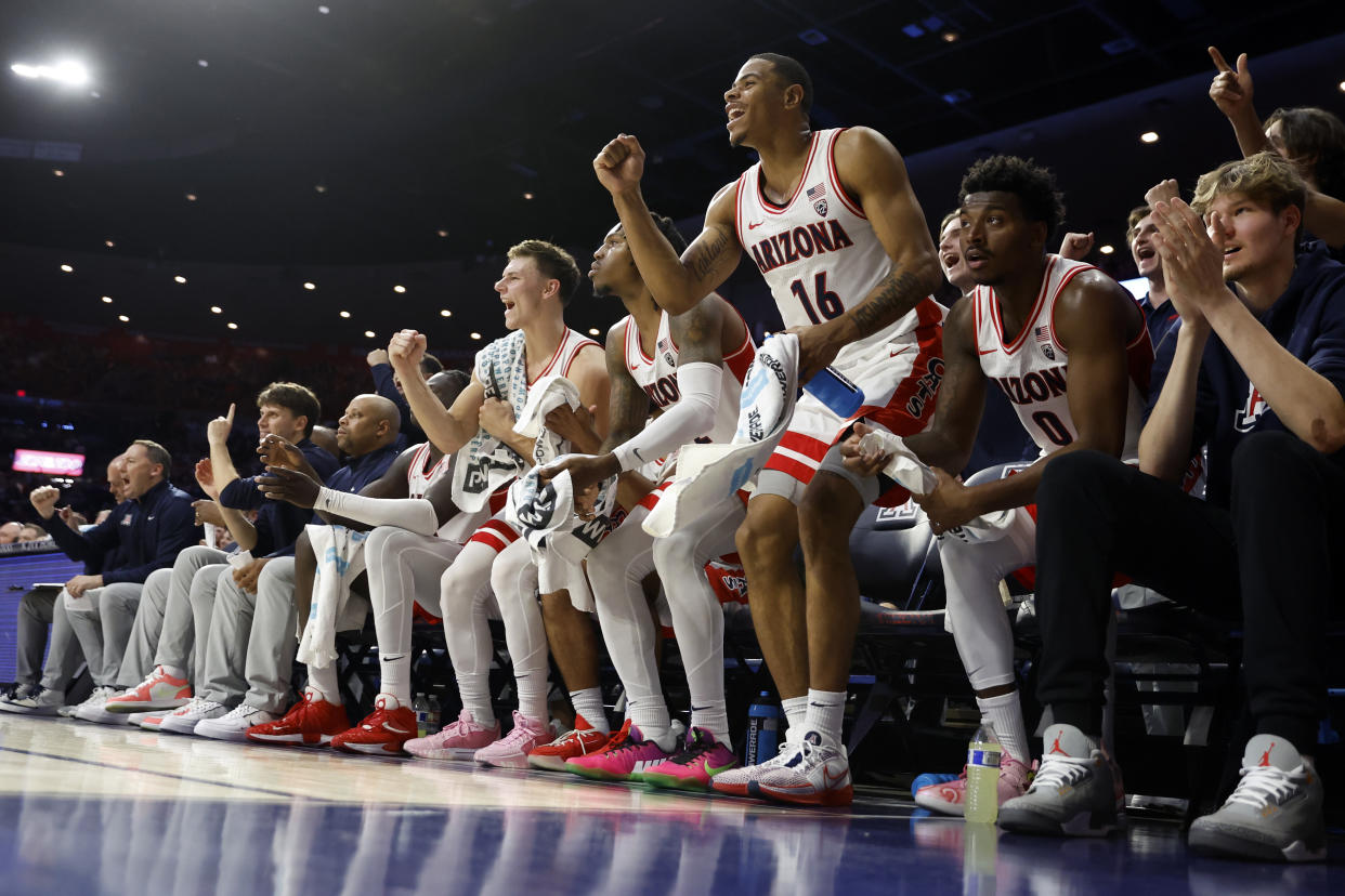 Arizona easily beat Wisconsin on Saturday to stay undefeated and hold onto its No. 1 ranking for a second week in a row.