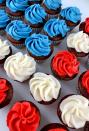 <p>Your Fourth of July cookout needs these mini desserts.</p><p>Get the recipe from <a href="http://www.twosisterscrafting.com/red-white-and-blue-mini-cupcakes/" rel="nofollow noopener" target="_blank" data-ylk="slk:Two Sisters Crafting;elm:context_link;itc:0;sec:content-canvas" class="link ">Two Sisters Crafting</a>. </p>