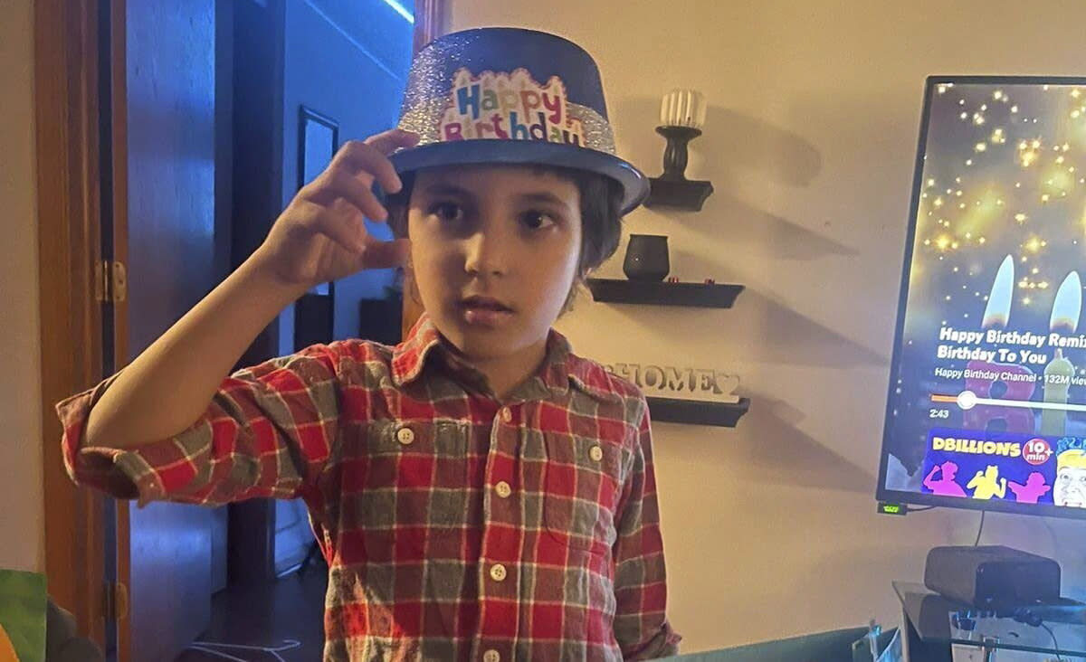 Wadea Al-Fayoume, the 6-year-old who was fatally stabbed over the weekend, shown wearing a hat that says Happy Birthday on it.
