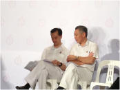 <span>PM Lee (R) sitting beside his party's Punggol East candidate Dr Koh Poh Koon. Lee says Koh is the right man for the job and is asking voters to elect him.<br></span>