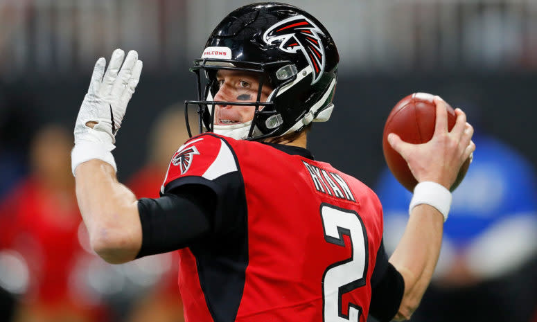 A closeup of Atlanta Falcons QB Matt Ryan throwing a pass.