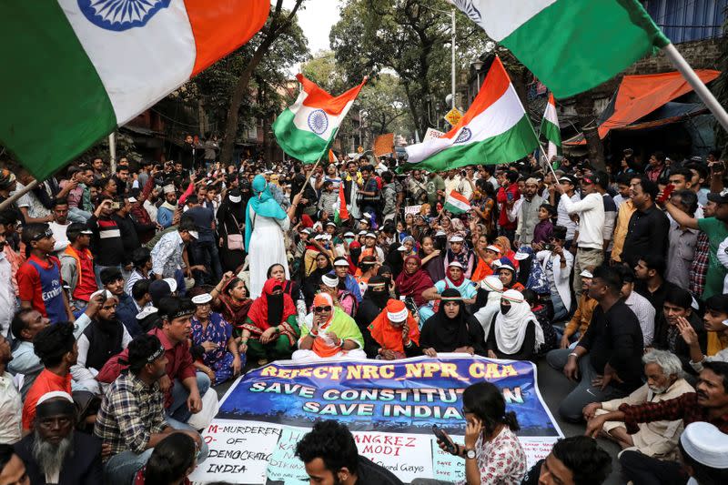 Demonstrators shout slogans during a protest against a new citizenship law in Kolkata