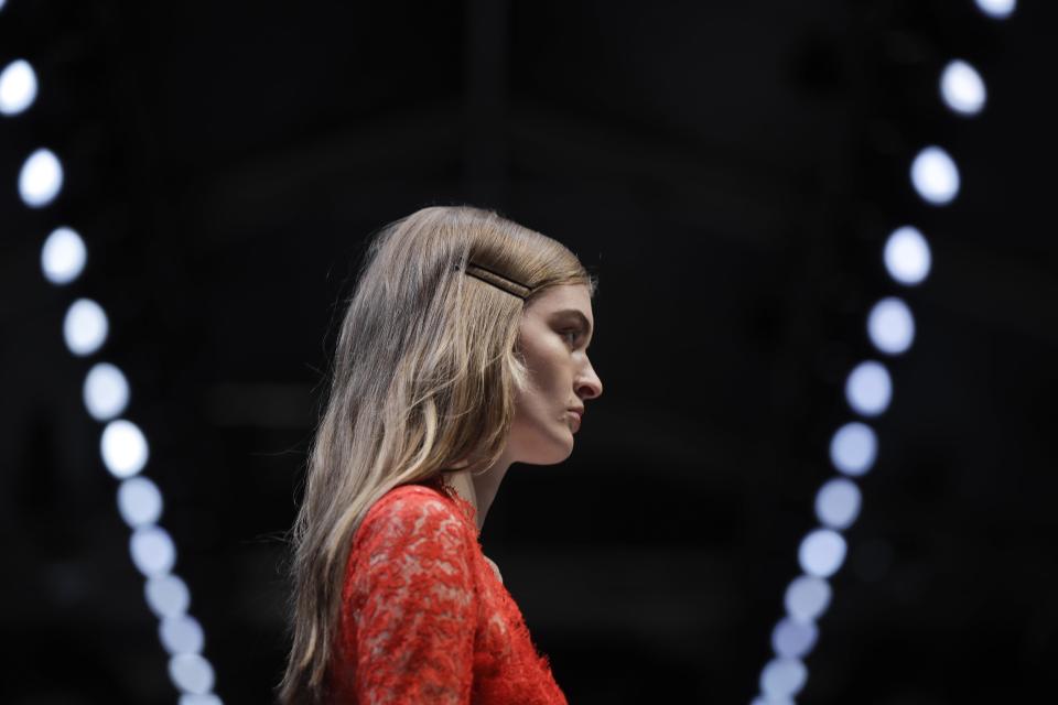 A model wears a creation for Ermanno Scervino women's Fall-Winter 2017-18 collection, in Milan, Italy, Saturday, Feb. 25, 2017. (AP Photo/Luca Bruno).