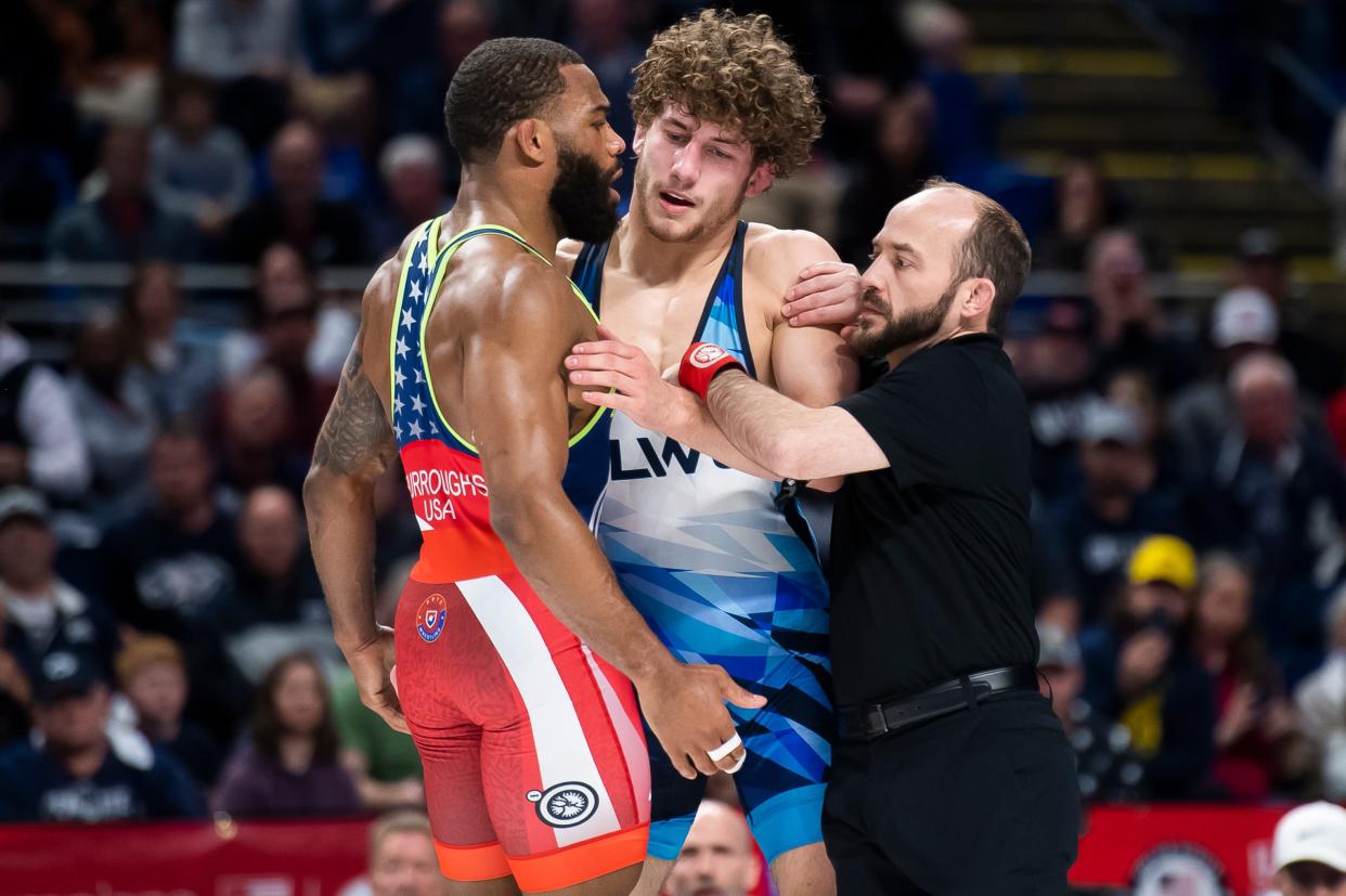 Jordan Burroughs (left) bumps into Mitchell Mesenbrink during their 74 kilogram challenge round semifinal bout at the U.S. Olympic Team Trials at the Bryce Jordan Center April 19, 2024, in State College. Burroughs won by decision, 8-3.