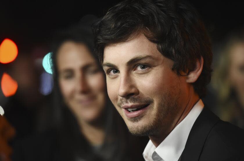 Logan Lerman, a cast member in the Amazon Prime Video series "Hunters," poses at the premiere of the show at the Directors Guild of America, Wednesday, Feb. 19, 2020, in Los Angeles. (AP Photo/Chris Pizzello)