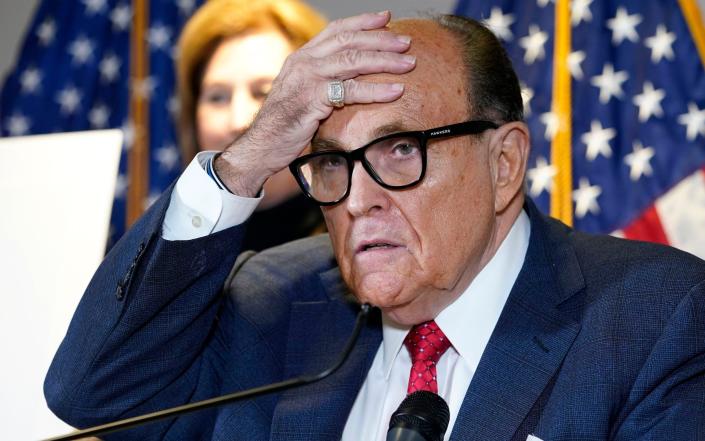 Mr Giuliani is being sued for alleged sexual assault - AP