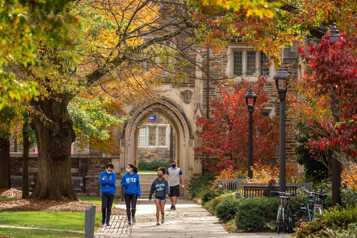 People walk on Duke University’s West Campus.