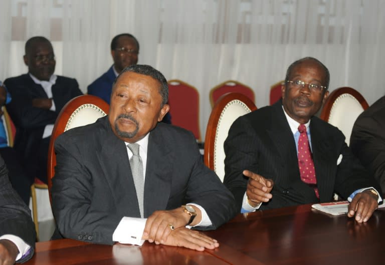 Gabonese opposition leader Jean Ping (L) who came in second in the vote, lashed the court's ruling as a miscarriage of justice and declared himself "president elect"